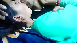 Kissing and pressing boobs of girlfriend