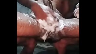 Indian boy bathing nude and showing long black desi dick