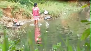 Aunty bathing outdoors